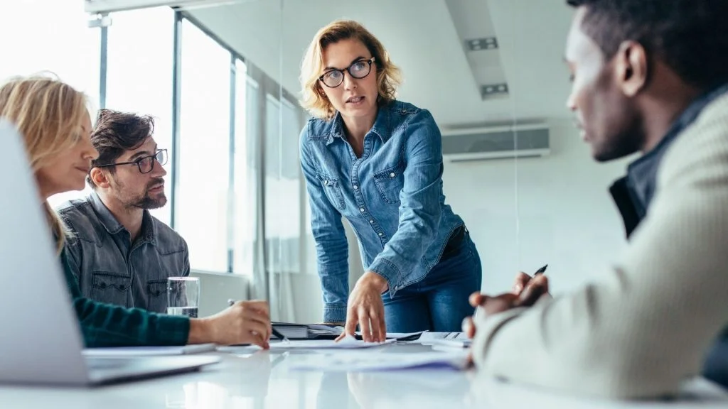 business woman leading meeting